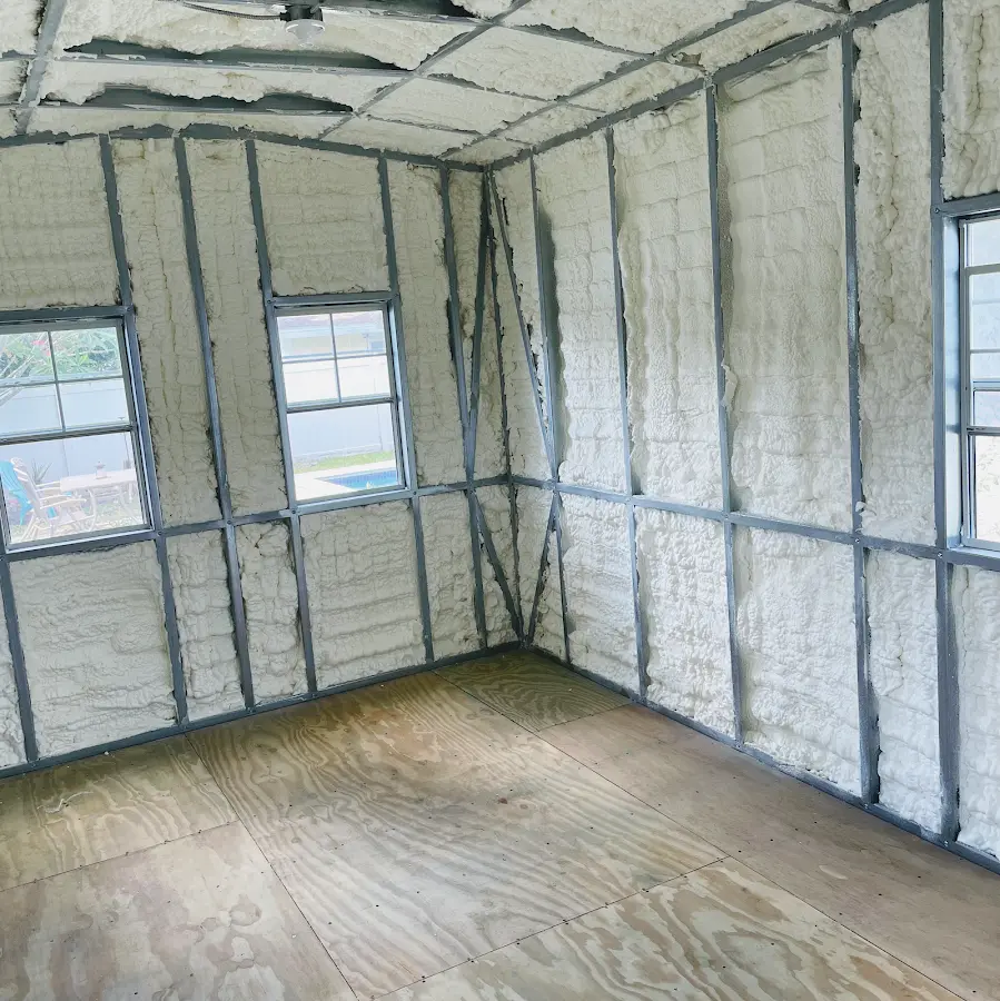 Closed-cell spray foam insulation applied to wall cavities in a residential project in Westchester