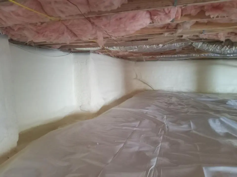 Crawl space encapsulation with closed-cell spray foam for Commercial Roof Restoration in Westchester